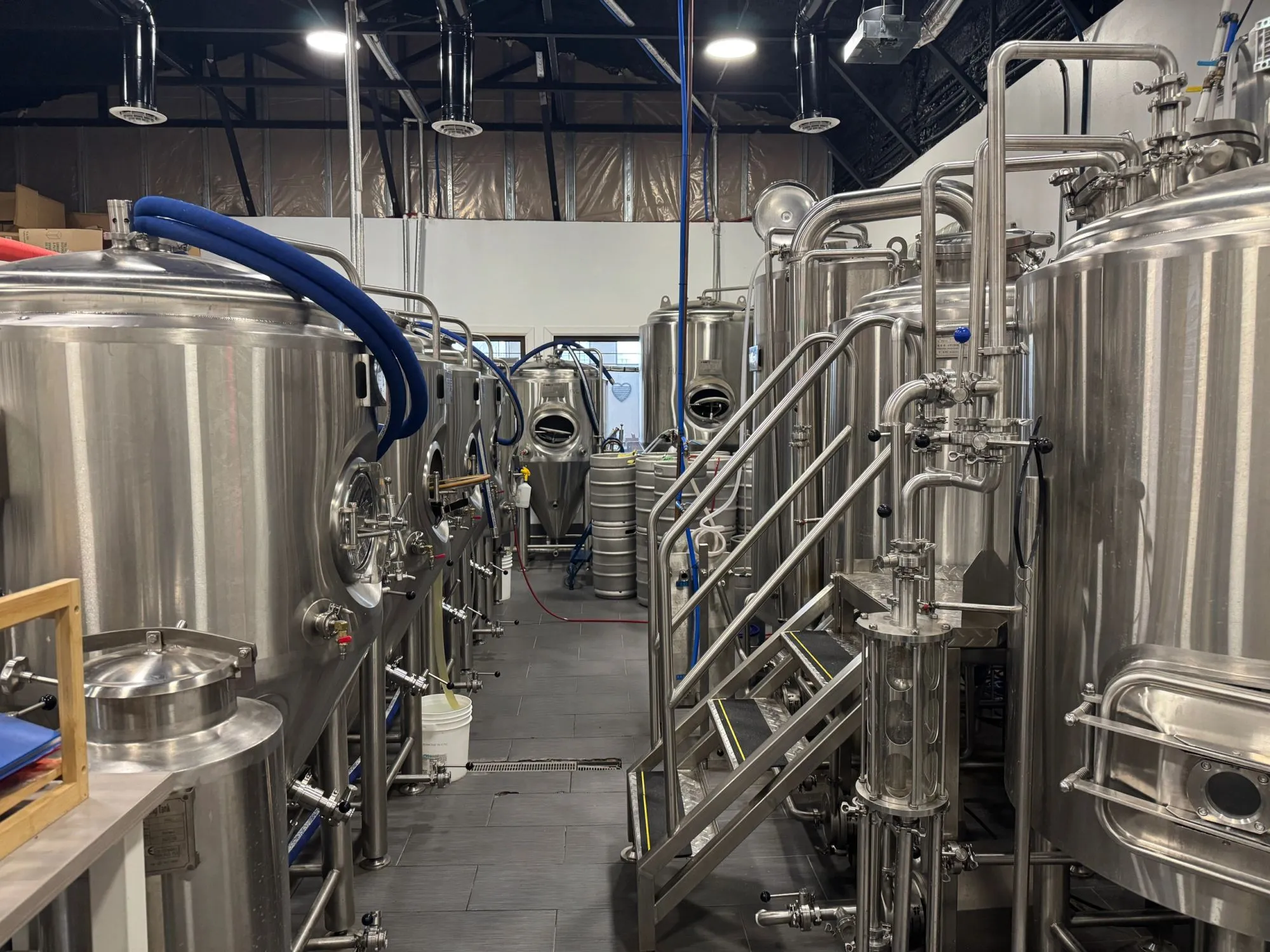 Stainless steel fermentation tanks in the Whites Ferry brewhouse